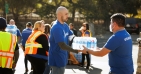 Socalgas employees unloading water for the needy